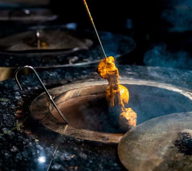 The Clay Oven at the Heart of Charcoal Tandoor Fire Grill